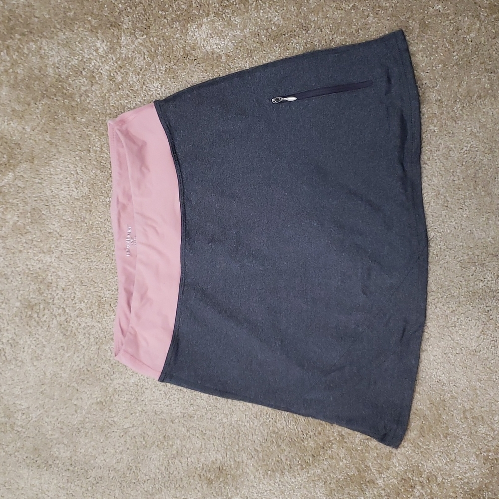 Stretchy sports skirt with built-in shorts